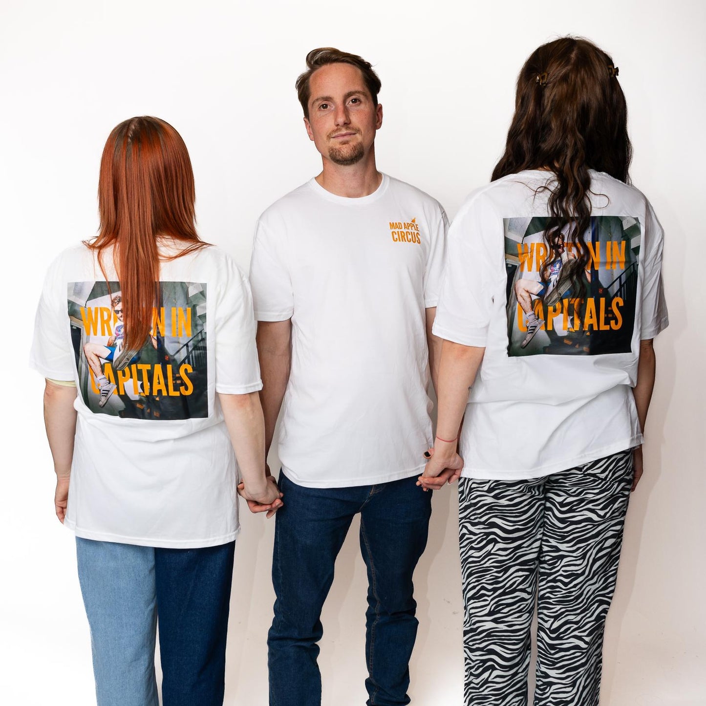 WRITTEN IN CAPITALS Tee